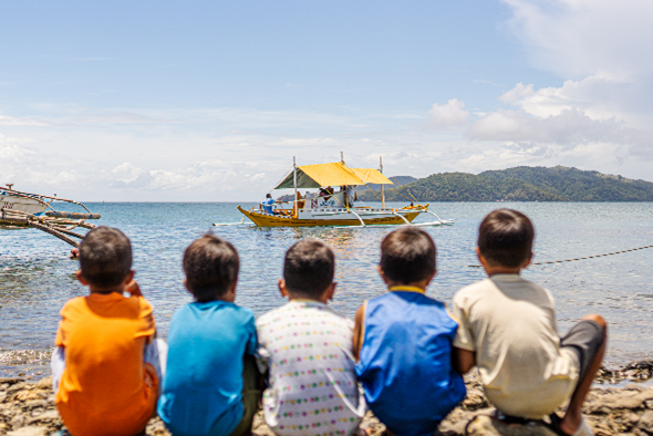 𝗢𝗻𝗲 𝗕𝗼𝗮𝘁, 𝗢𝗻𝗲 𝗕𝗮𝗴, 𝗢𝗻𝗲 𝗖𝗵𝗶𝗹𝗱: 𝗦𝘁𝗼𝗹𝘁-𝗡𝗶𝗲𝗹𝘀𝗲𝗻 𝘁𝗶𝗲𝘀 𝗯𝗿𝗶𝗻𝗴 𝗵𝗼𝗽𝗲 𝗳𝗼𝗿 𝗲𝗱𝘂𝗰𝗮𝘁𝗶𝗼𝗻 𝘁𝗵𝗿𝗼𝘂𝗴𝗵 𝗺𝗼𝘁𝗼𝗿 𝗯𝗮𝗻𝗰𝗮, and 𝘀𝗰𝗵𝗼𝗼𝗹 𝘀𝘂𝗽𝗽𝗹𝗶𝗲𝘀 𝗱𝗼𝗻𝗮𝘁𝗶𝗼𝗻